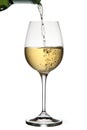 Pouring white wine Royalty Free Stock Photo