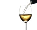 Pouring white wine into glass Royalty Free Stock Photo