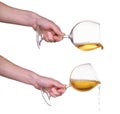 Pouring white wine from glass with hand, wine, splash, jet isolated on white