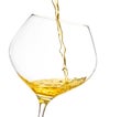 Pouring white wine into a glass with space for text Royalty Free Stock Photo