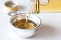 Pouring White Wine Vinegar into a Measuring Cup Royalty Free Stock Photo