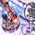 Pouring wine. Christmas wine. Christmas, falling snow, golden snowflakes. New Year