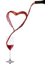 Pouring wine heart romantic shape to elegant glass