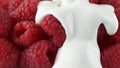 Pouring Yogurt over Ripe Raspberry Fruits in Macro and Slow Motion 1000fps