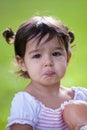 Pouting baby girl with big brown eyes Royalty Free Stock Photo