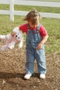 Pouting Child with Stuffed Animal in Hand Royalty Free Stock Photo