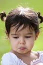 Pouting little girl outdoors Royalty Free Stock Photo