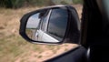 POV car driving on asphalt highway. Left side traffic. Savannah road in Africa. Royalty Free Stock Photo