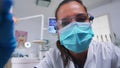 Pov of dentist working on patient mouth hygine