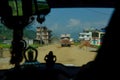 POV: Driving down the bumpy gravel road in countryside and towards an old truck