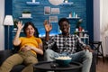 POV of happy multiethnic couple on videoconference call in living room Royalty Free Stock Photo