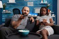 POV of interracial couple with technology expecting child Royalty Free Stock Photo