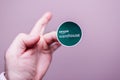 POV male hand holding green Amazon Prime Warehouse sticker glued