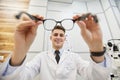 POV Optician Holding Glasses Royalty Free Stock Photo