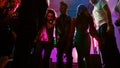 POV of persons dancing at colorful party Royalty Free Stock Photo