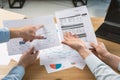 POV point of view cropped photo of two unit person in formal wear stand behind desktop table in loft interior workplace make Royalty Free Stock Photo