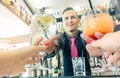 Pov prospective of young woman taking cocktails from professional bartender - Entertainment,party,lifestyle,drinking concept -