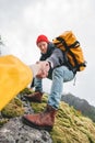Two travelers climb to mountains lifestyle outdoor vacation. Vertical