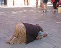 Poverty and begging, woman with paper cup Royalty Free Stock Photo