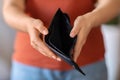 Poverty Concept. Unrecognizable Woman Showing Empty Wallet At Camera Royalty Free Stock Photo