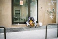 Poverty, homless man sleeping on the street.