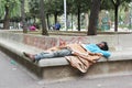 Poverty, homeless man sleeping on the street. Royalty Free Stock Photo