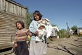 Poverty, mother and children in slum