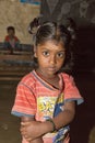 Poverty, portrait of a poor little Indian child girl lost in deep thoughts Royalty Free Stock Photo