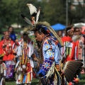 Pow wow man dancer with eagle staff