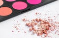 Powder in the balls with a radiant effect on the background of the set for blush. Make-up cosmetics, Royalty Free Stock Photo