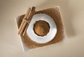 Powder cinnamon and sticks and on brown rustic background. Royalty Free Stock Photo