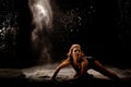 Powder dancer action low key Royalty Free Stock Photo