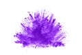 Closeup of a purple dust particle explosion isolated on white background. Royalty Free Stock Photo