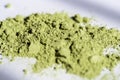 The powder of Japanese tea smeared in the sunshine is very beautiful green Royalty Free Stock Photo