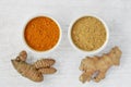 Powder and roots of turmeric and ginger
