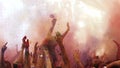 Powder is thrown at holi colour festival in slow motion