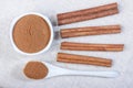 Powdered cinnamon in a ceramic bowl, cinnamon, close-up, ceramic