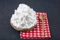 Powdered cream Powder Cream whipped cream in plate on wooden floor. Cooking buttery cream on kitchen