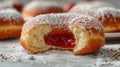 Powdered Doughnut stuffed with jelly With Bite Taken Out Royalty Free Stock Photo