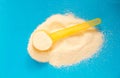 Powdered Milk, Baby Formula with spoon infant formula in can and bottle Royalty Free Stock Photo