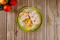 Powdered sliced apple strudel on green plate with fresh apples Royalty Free Stock Photo