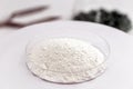 Powdered sodium percarbonate is an oxidizing chemical used in bleaching systems in general