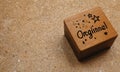 wooden block with the word ogging written on it