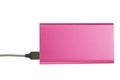 Power bank for charging mobile devices. Pink smart phone charger with power bank. battery bank Royalty Free Stock Photo