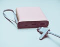 Power bank for charging smartphones and gadgets with a usb cable Royalty Free Stock Photo