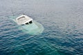 Power boat sinked in the sea coast of Hondarribia, Basque country, Spain Royalty Free Stock Photo