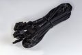 Power cable of modular computer power supply in braided sleeving Royalty Free Stock Photo