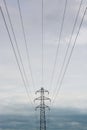 Power cables and tower on overcast day in UK Royalty Free Stock Photo