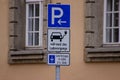 Power charging station sign for electric cars with a limited parking period