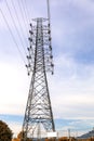 High voltage electric transmission iron tower with high voltage power lines Royalty Free Stock Photo